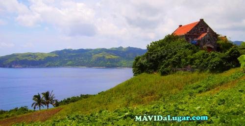 A house on a hill overlooking the sea in Batanes