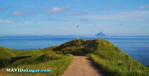 Batanes near Rolling Hills with Itbayat at the background.